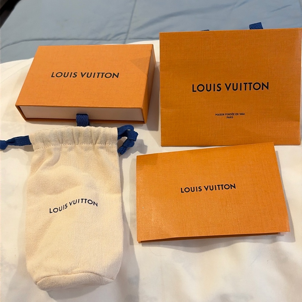 Louis Vuitton small box gift bag and card  and cloth bag all empty and new